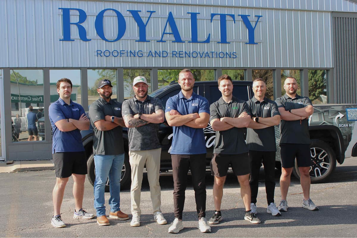 Royalty Roofing and Siding residential project managers standing together outside the Omaha office